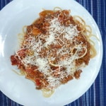 Spaghetti with marinara sauce on a plate.