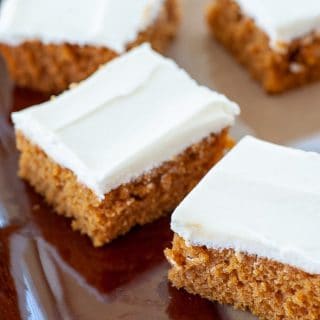 pumpkin bars on a serving dish.
