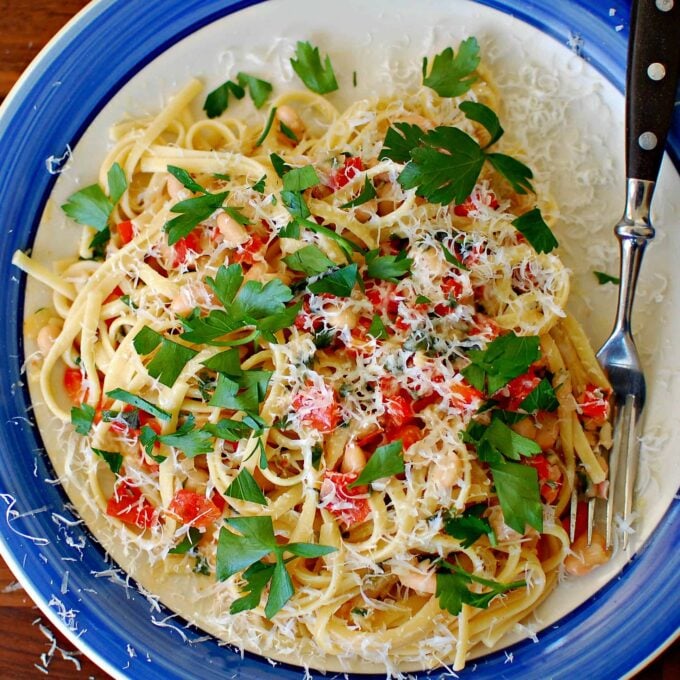 Plate of pasta with a fork.