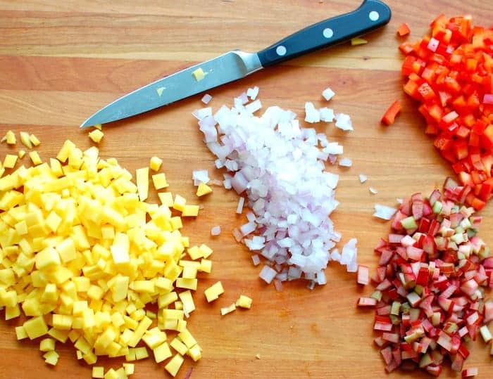 Chopped mango, rhubarb, onion, and red pepper for rhubarb salsa.