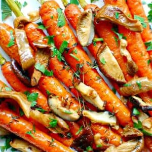 Roasted whole carrots with mushrooms.