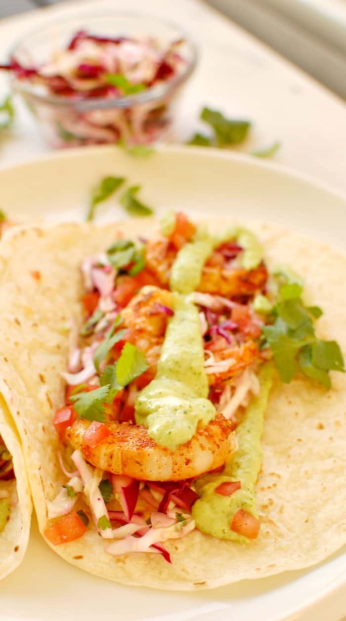 Close up view of a shrimp taco.