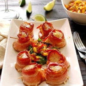 Bacon wrapped scallops with mango salsa.