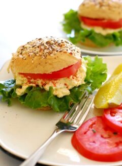 rye sandwich rolls with egg salad and tomatoes