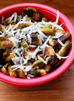 Spiced up roasted Brussels sprouts. Finished off with a little hot sauce, these are not your Mama's crumby Brussels sprouts! | joeshealthymeals.com