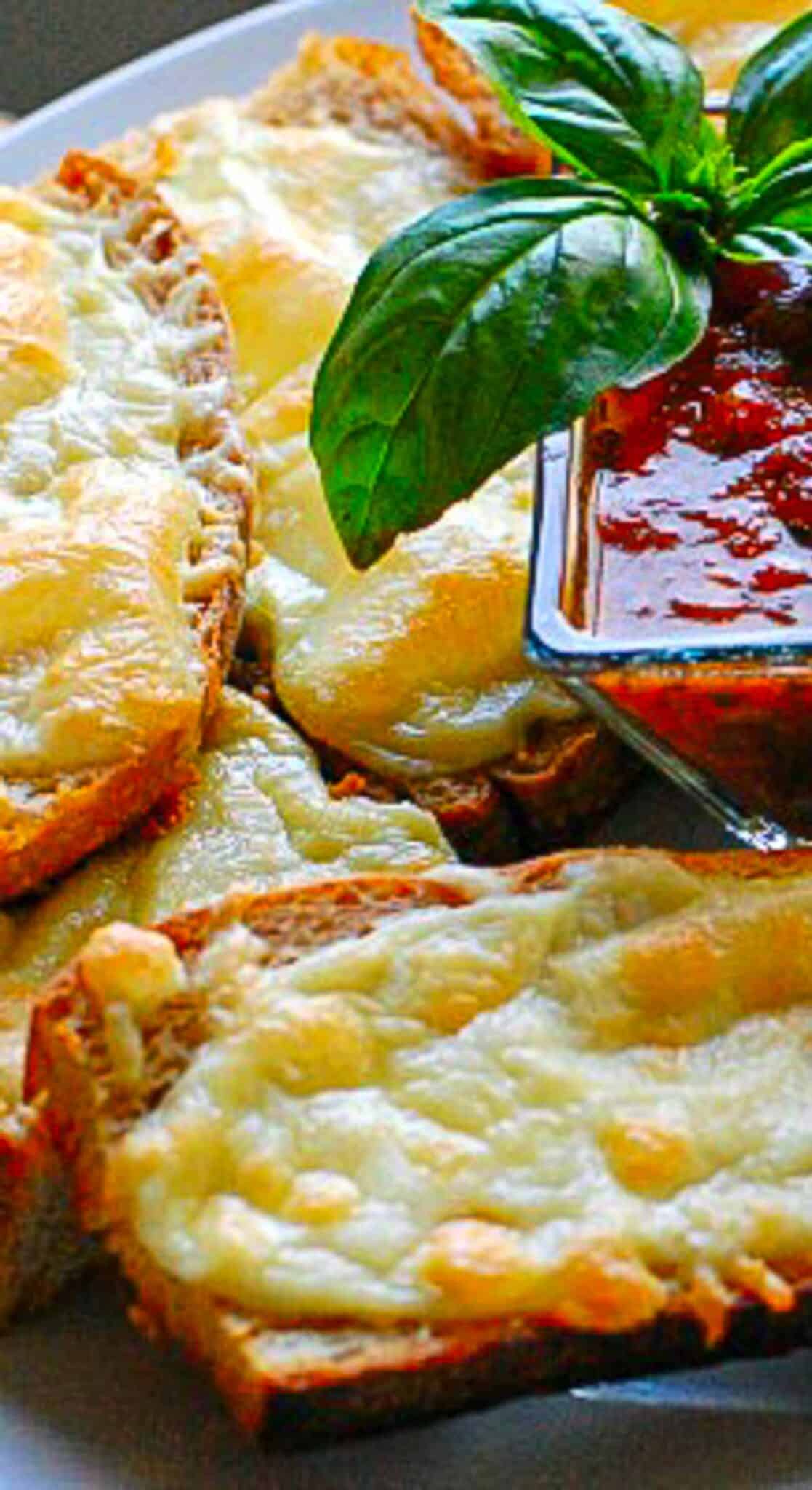 Cheesy Italian toasts with marinara sauce.