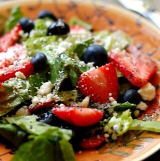 Strawberry salad with poppy seed dressing. Wonderfully refreshing summertime salad that everyone loves. | joeshealthymeals.com