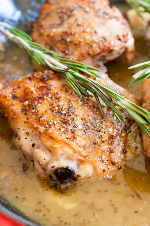 Chicken thighs with honey mustard. Easy, delicious way to prepare chicken. Brown, bake, and serve. | joeshealthymeals.com