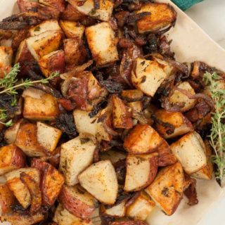 Roasted red potatoes with onions and bacon. Delicious combination of sights and smells. The bacon is wonderful. | joeshealthymeals.com