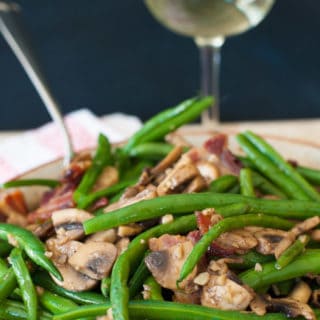 Green beans with mushrooms and bacon. Easy and delicious side dish with lots of bacony flavor and green bean freshness. | joeshealthymeals.com