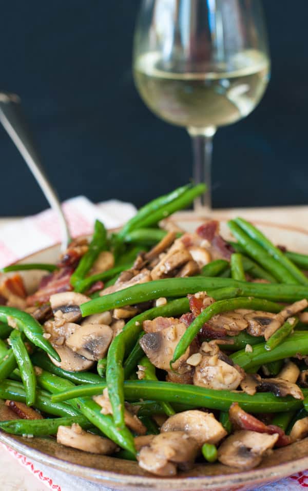 Green beans with mushrooms and bacon ready to serve.