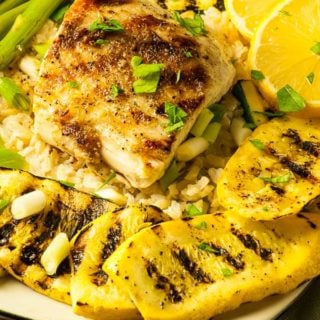 Mahi mahi with market vegetables. Perfectly seared, moist fish with pan roasted vegetables. All on a bed of brown rice. | joeshealthymeals.com