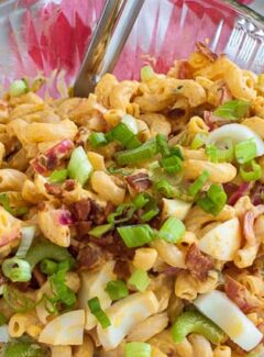 Macaroni deviled egg salad in a bowl. Delicious salad that everyone will love. Its deviled eggs in a bowl. | joeshealthymeals.com