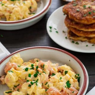 Creamy scrambled eggs with smoked salmon. Tasty for breakfast, lunch, or dinner. | joeshealthymeals.com