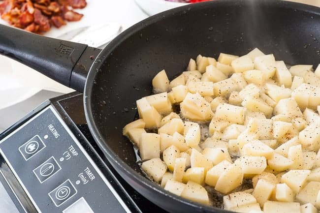 Potatoes being browned for breakfast hash.