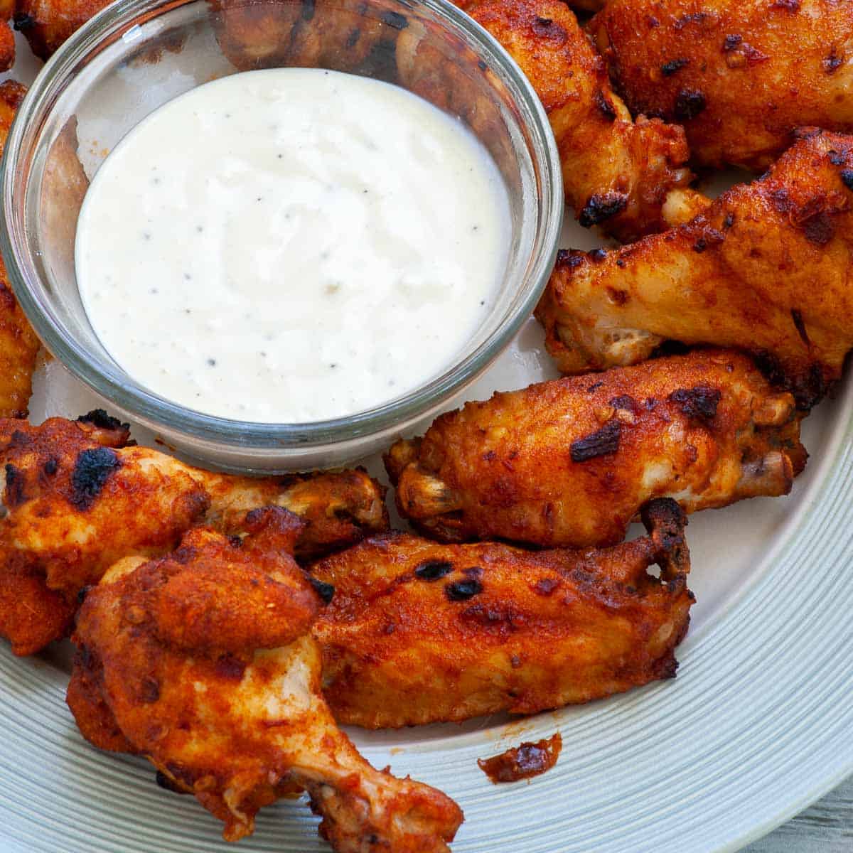 plate of chicken wings and ranch dip