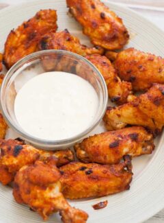 Delicious plate of glazed chicken wings. | joeshealthymeals.com