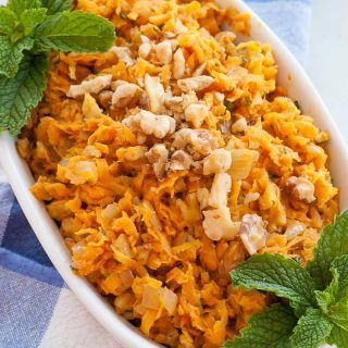 Sauteed shredded sweet potatoes is a perfect side dish kicked up with onions and walnuts. | joeshealthymeals.com