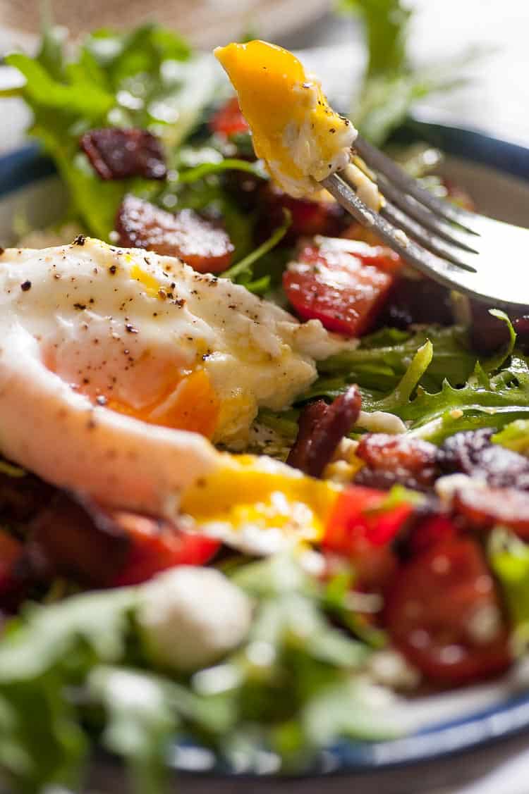 Curly endive lettuce salad with bacon and poached egg. | joeshealthymeals.com