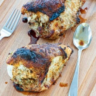 Two baked chicken breasts.