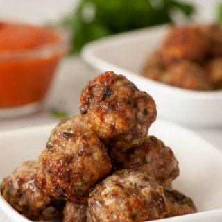 Oven baked meatballs made with ground beef and pork.