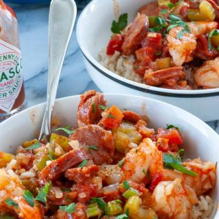 Two bowls of jambalaya ready to eat.