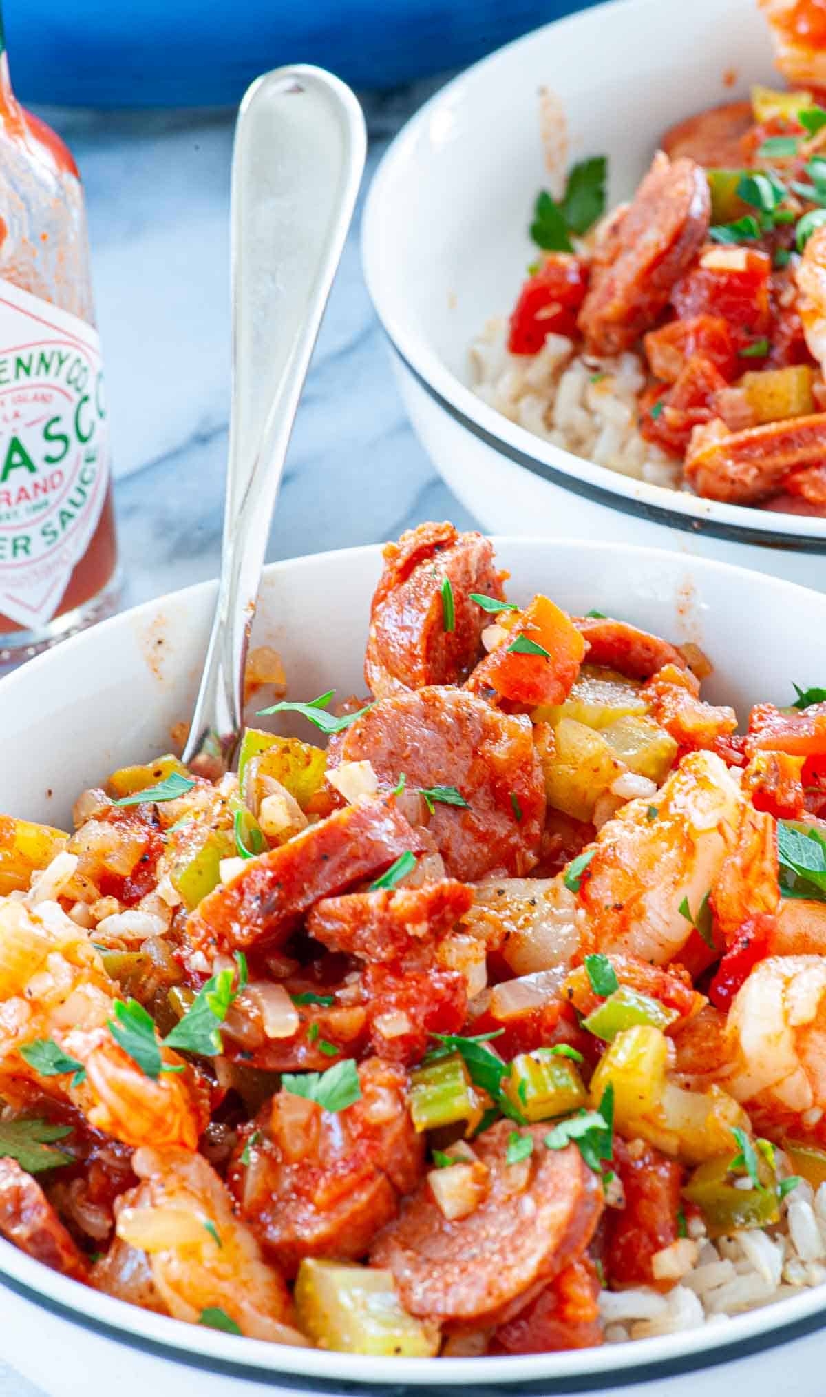 Bowl of jambalaya with a spoon.