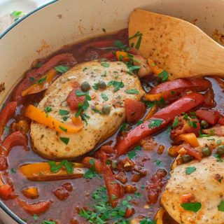 Italian chicken in a casserole dish ready to serve.