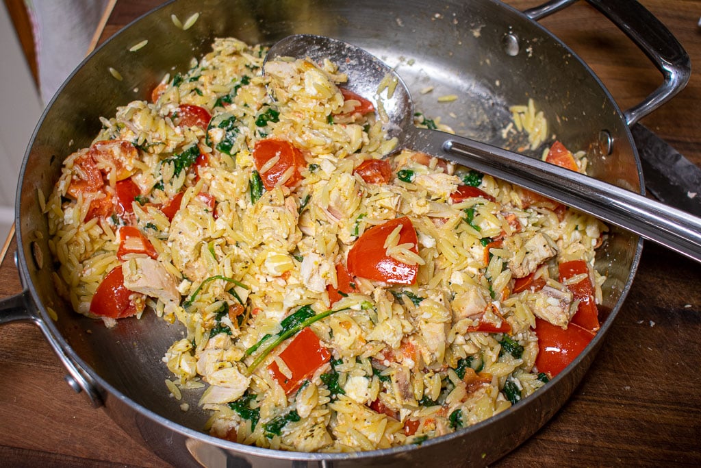 Finished orzo chicken in the skillet.