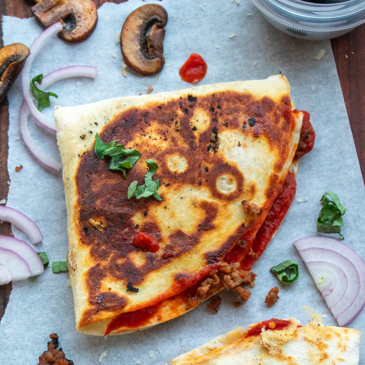 A personal tortilla pizza ready to eat.