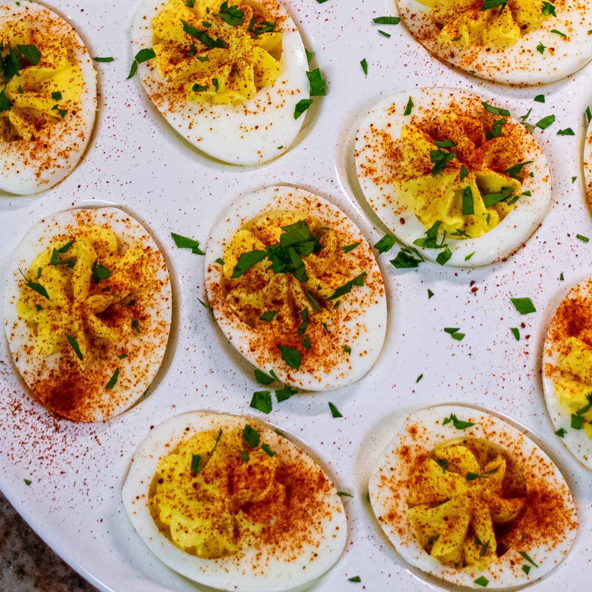 Overhead view of a plate of deviled eggs.