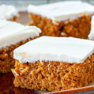Moist, delicious pumpkin bars on a serving dish.