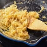 Caramelized onions in a cast iron skillet.